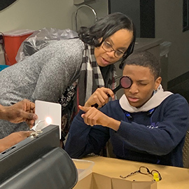 Student doing eye test