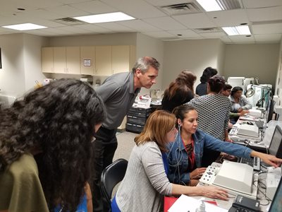 audiology students using audiometers during summer workshops