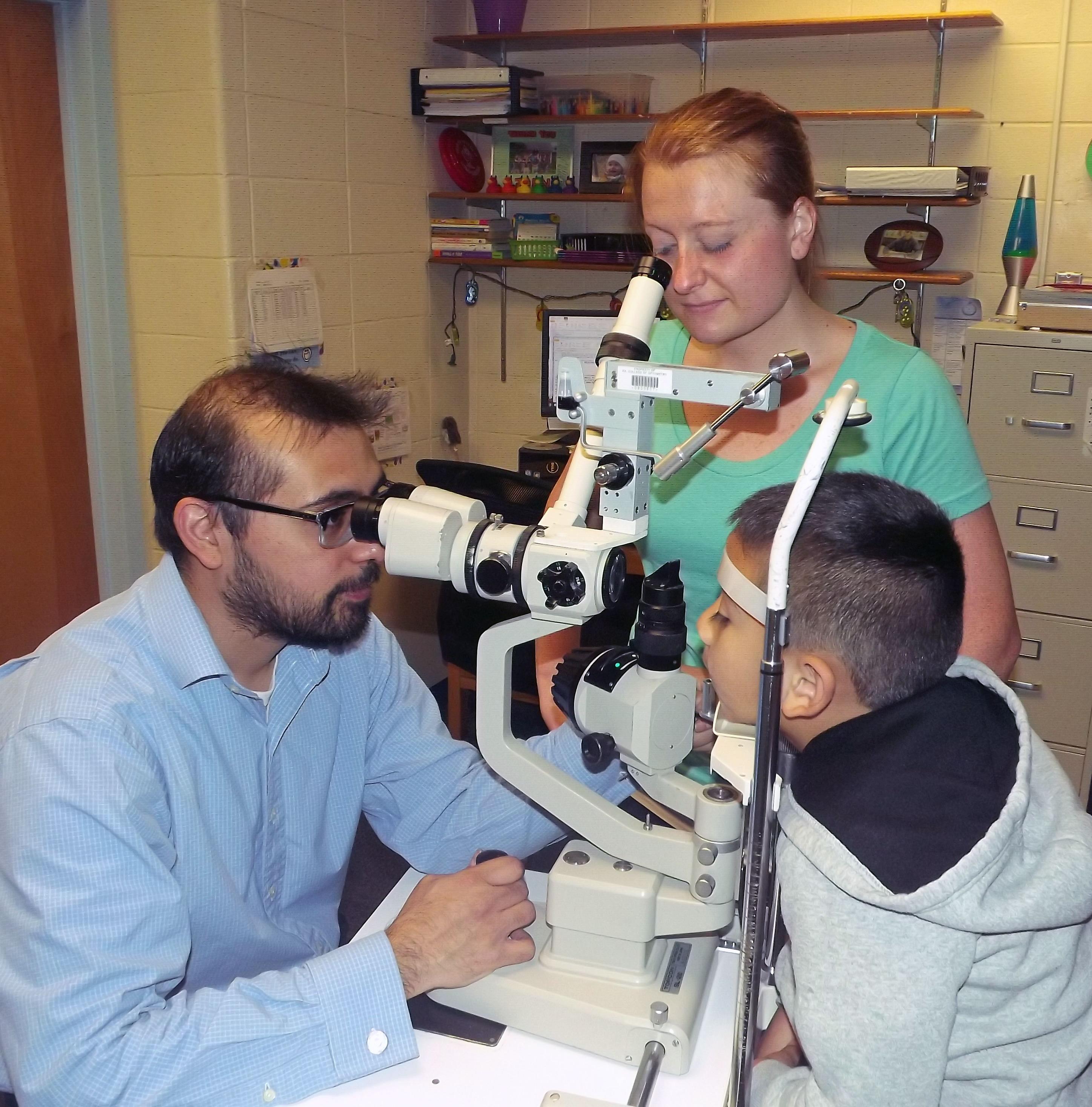 Dr. Trujillo working with a patient. 