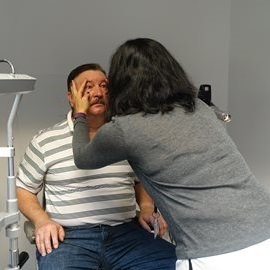 man getting eye exam