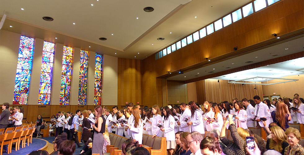 students in white coats