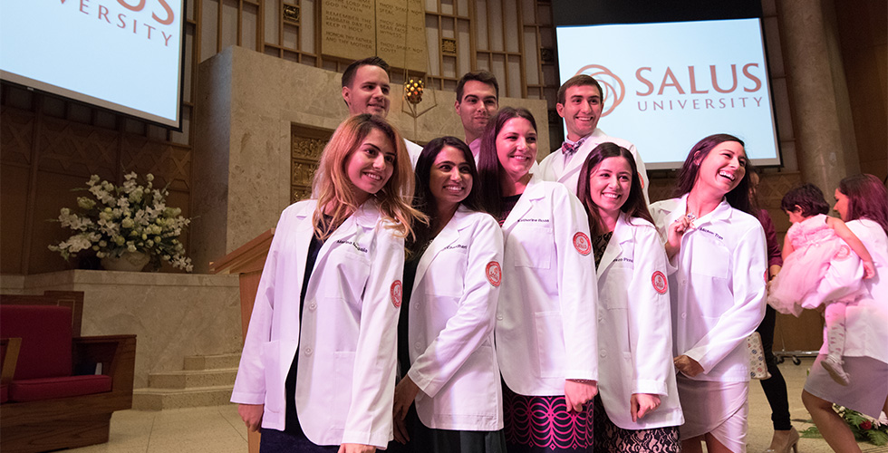 students in white coats