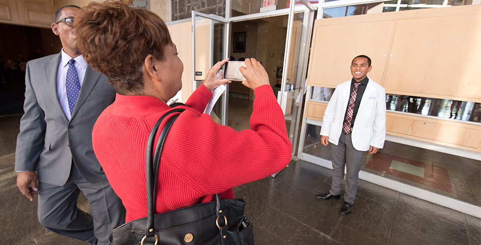 student getting his photo taken