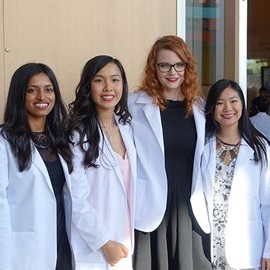 students in white coats