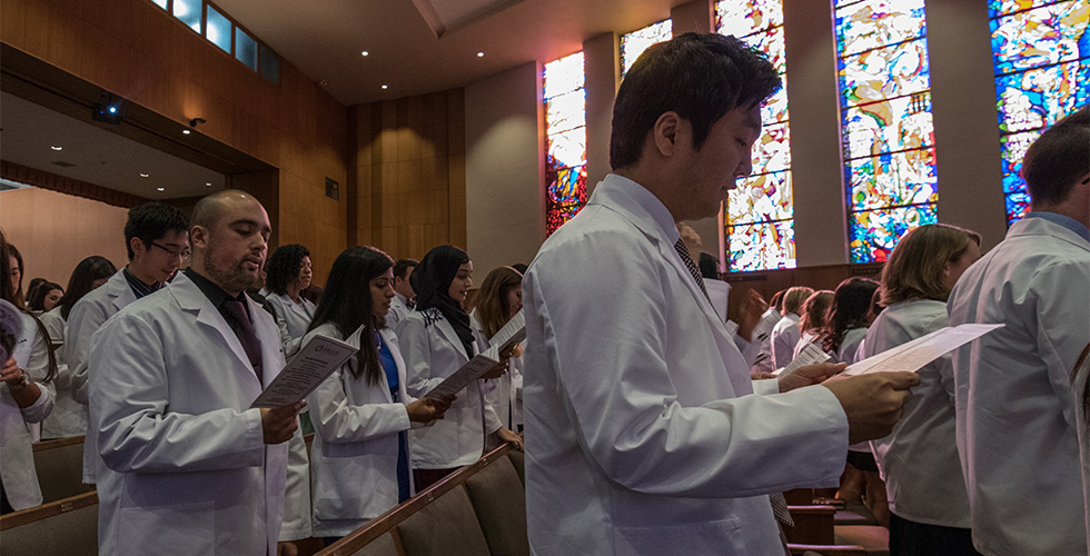 students in white coats