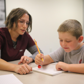 OT professional with child