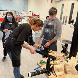 O&P students working in the lab with instructor