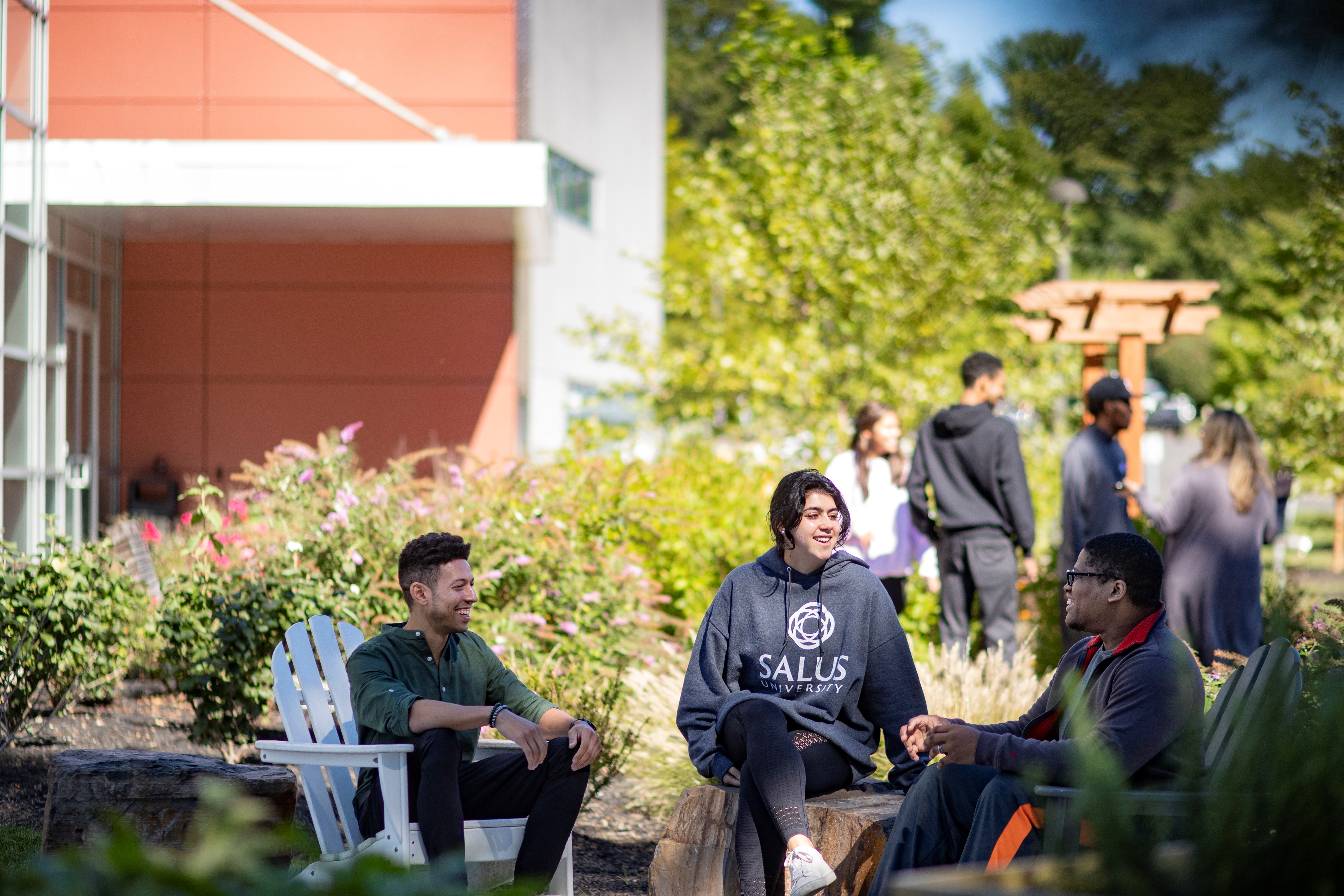 Three students in sensory garden