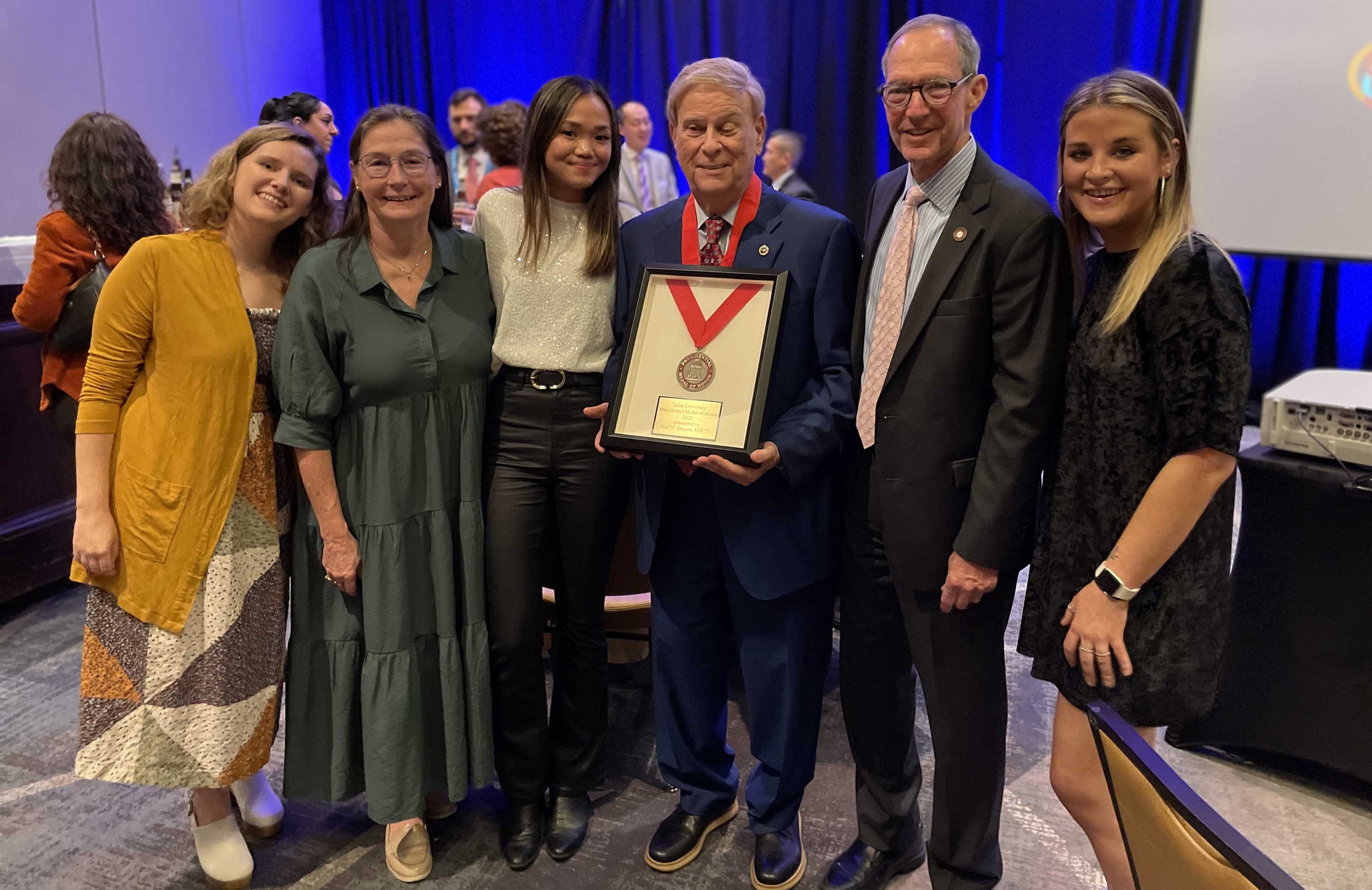 Neil Draisin with award