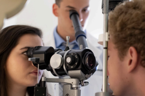 student conducting eye exam