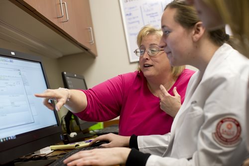 Jill Grogg working with a student