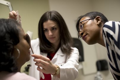 woman getting eye exam