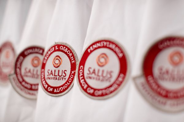 white coats with Salus patches