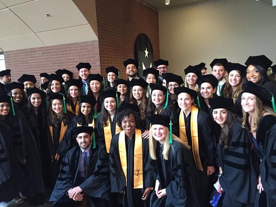 Graduates at commencement in regalia