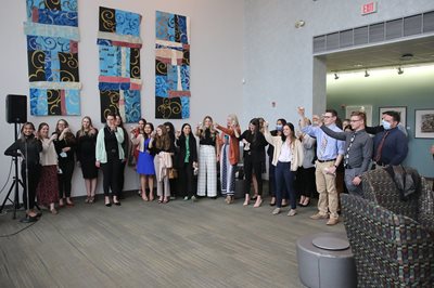 AUD students toasting at externship celebration