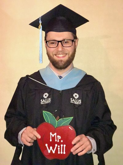 William Hanuschock in his graduation regalia