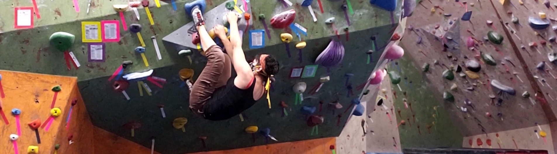 Angela Delfino rock climbing