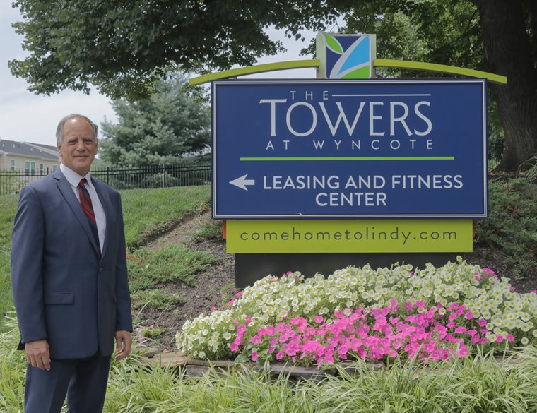 Alan Lindy in Front of the Towers at Wyncote building