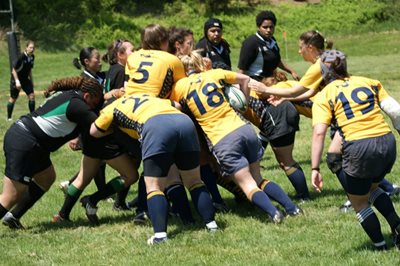 Anna Grasso playing rugby