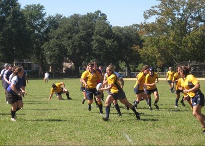 Anna Grasso playing rugby