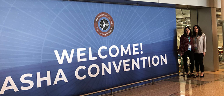 Faculty at the ASHA convention welcome poster