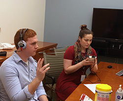 students conducting a hearing exam