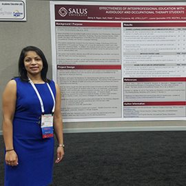 Dr. Rajan in front of her poster