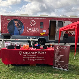 Salus table at the LeVine Backstretch Clinic Health Fair