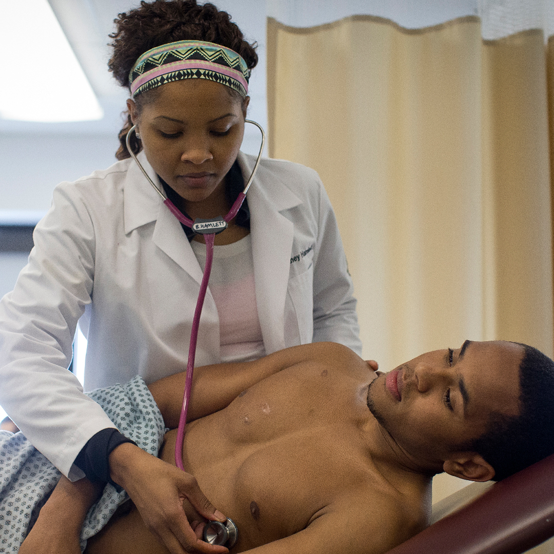 Brittney Hamlett working with a patient