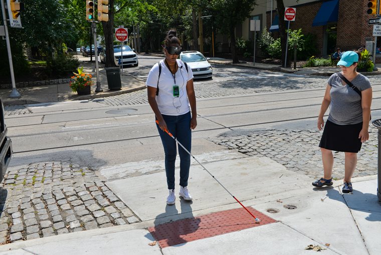 O&M students practicing walking with a white cane