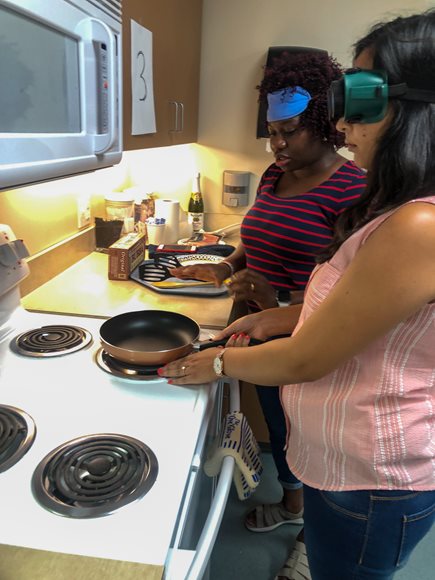 BLVS student cooking with blindfolds