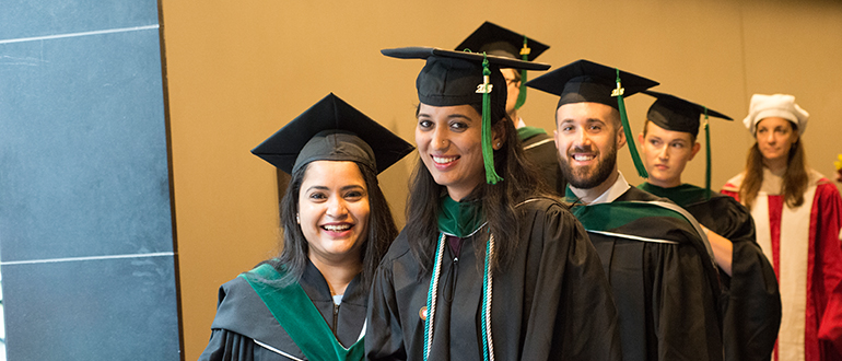 Students in graduation regalia