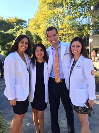 students in white coats