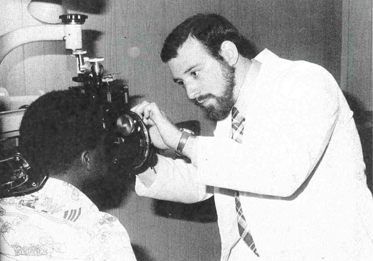 Dr. Brilliant providing an eye exam