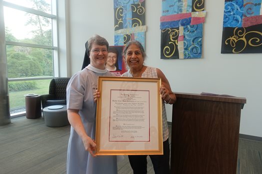 Sister Lisa Ann Lettiere receiving award