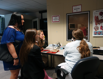 audiology students in lab