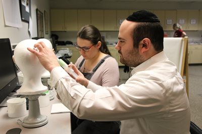 Students making ear molds