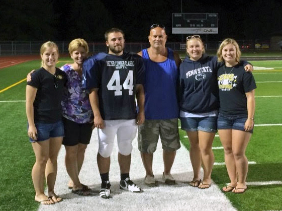 group photo on football field