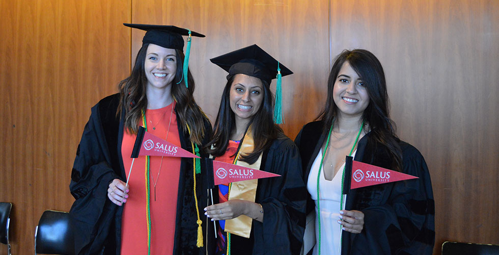 grads with salus flags