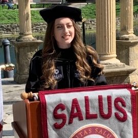 Gina Lerner at commencement podium