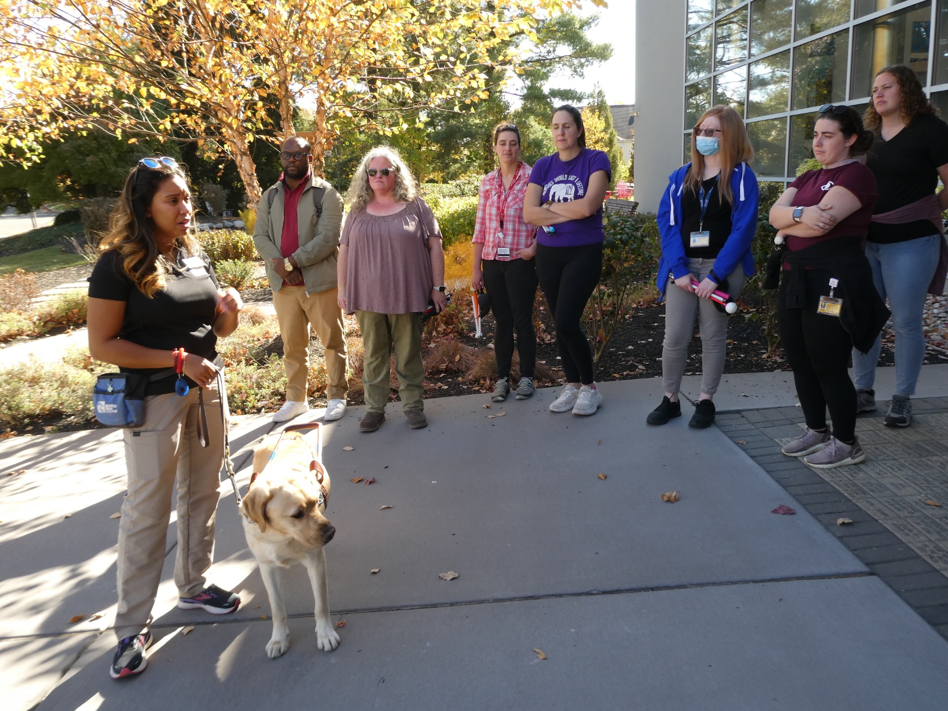 Guide dog trainer talking to O&M students