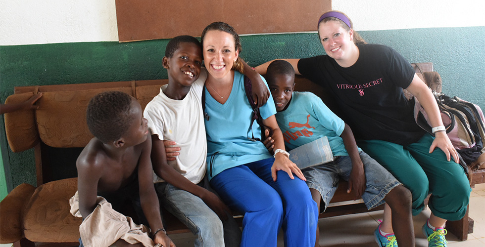 SOSH students with kids in Haiti