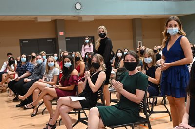 Long white coat attendees