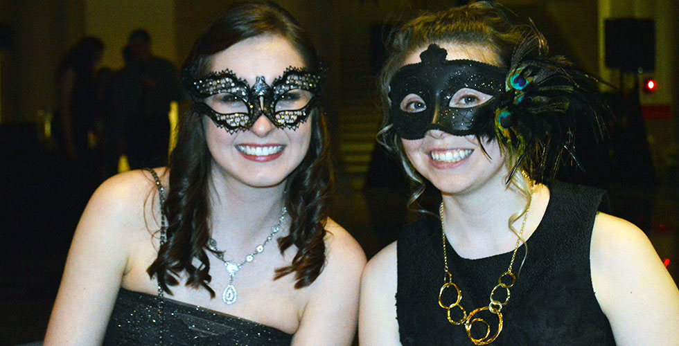 students wearing masks at soiree