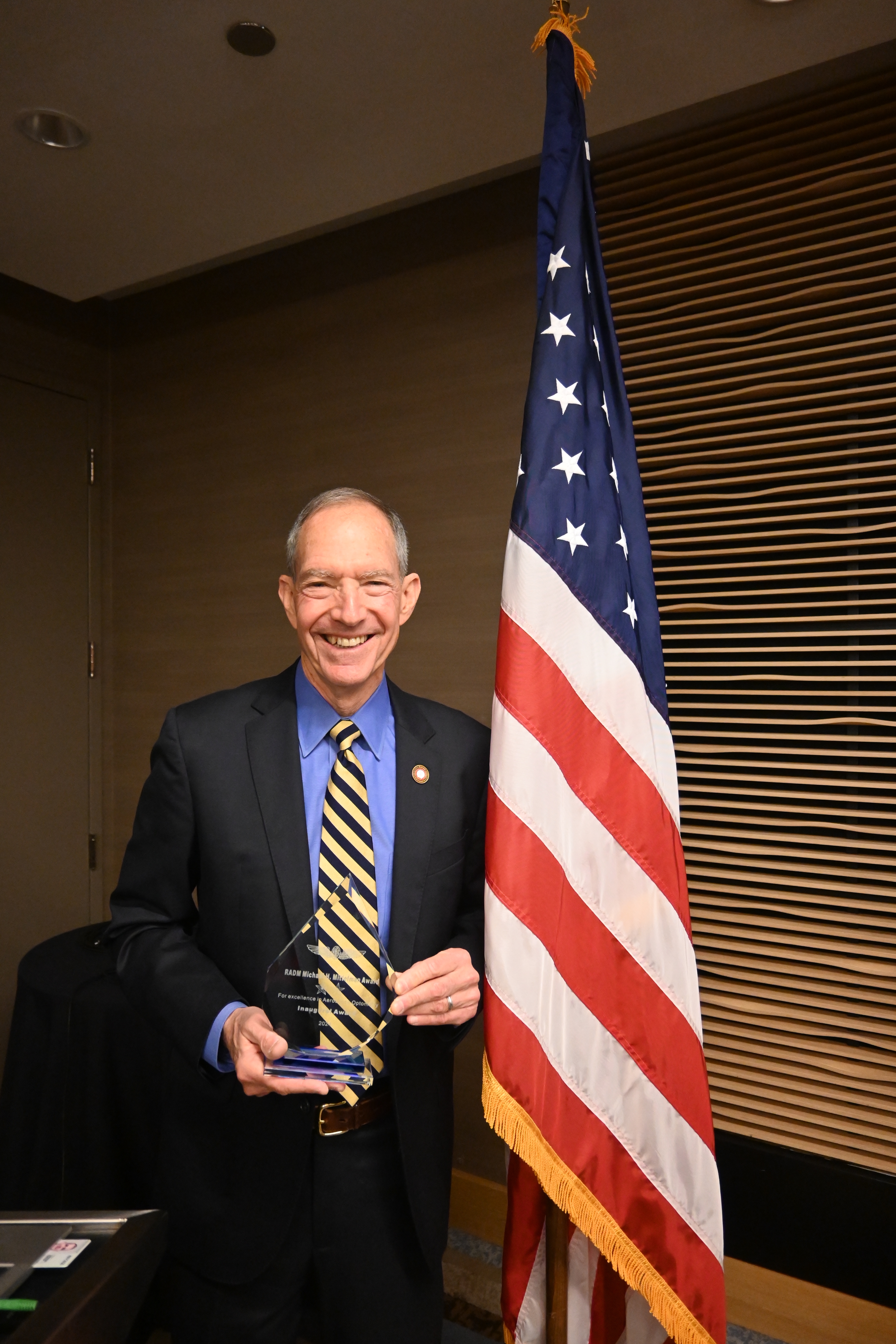 Dr. Mittelman, award and flag