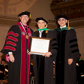 Dr. Scheiman being presented an honorary degree