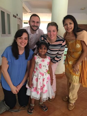 Students in India with a pediatric patient