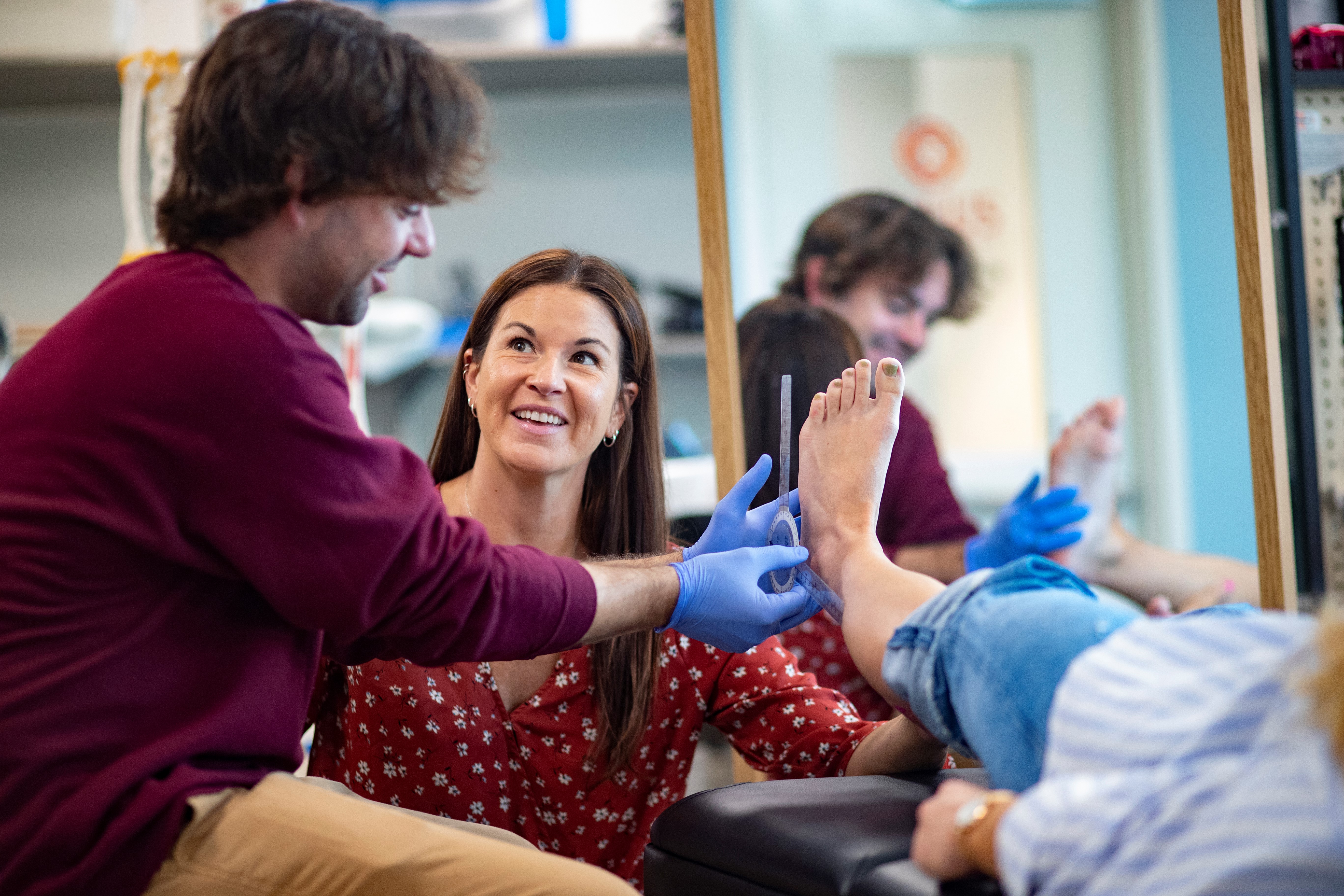 op-accreditation teacher and student in lab