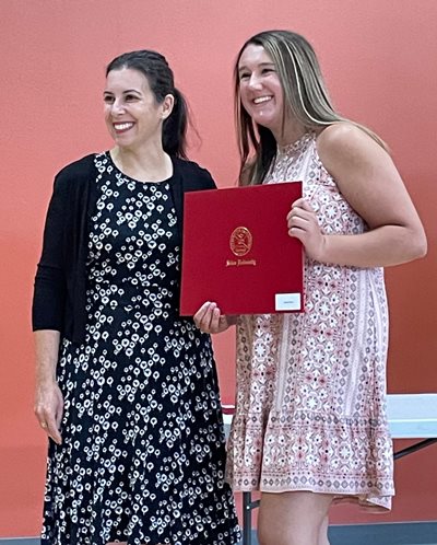 OT student receiving diploma