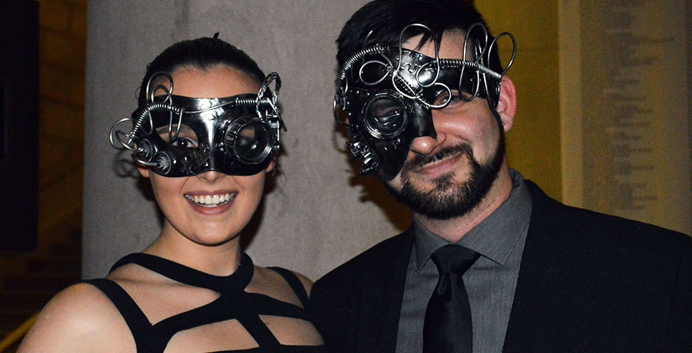 couple wearing Robot Masks